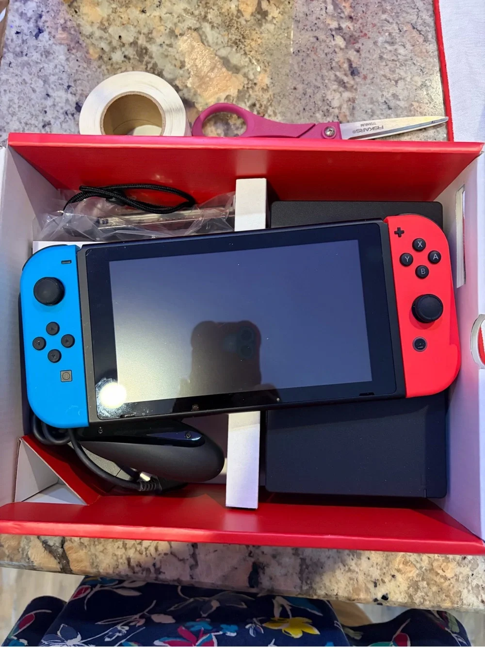 Nintendo Switch with Neon Blue Left and Neon Red Right Joy-Con